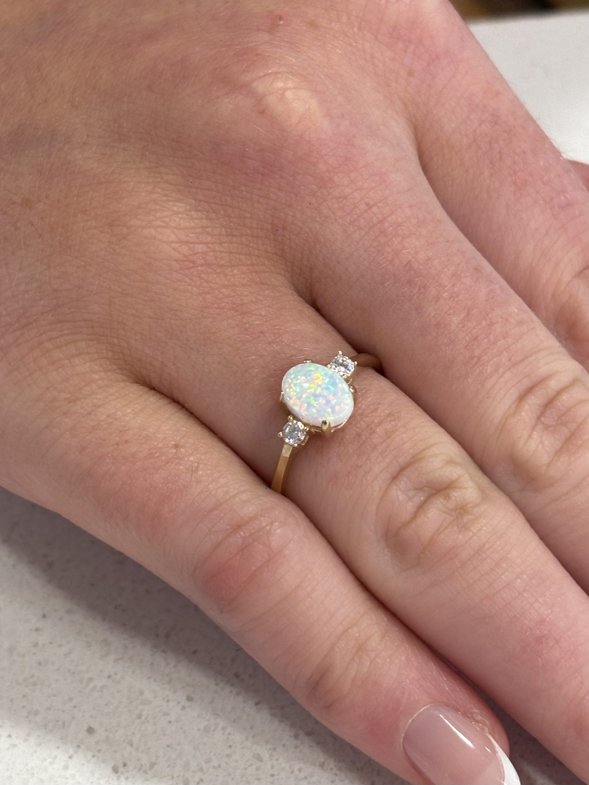 9ct Yellow Gold Created Opal and Cubic Zirconia Three Stone Ring